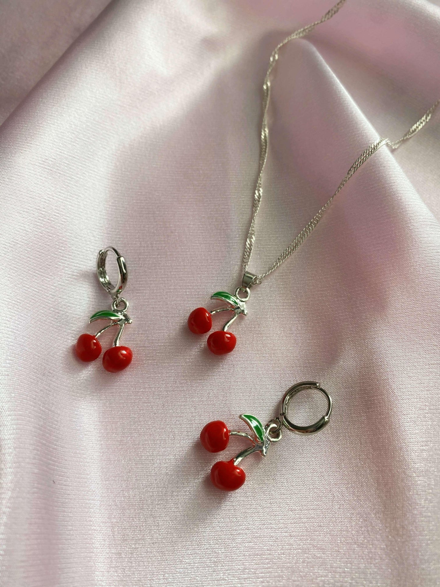 Load image into Gallery viewer, Cherry Bomb Huggies - Luna Alaska Jewelry silver cherry earrings cherries dainty hoops red enamel cute jewelry
